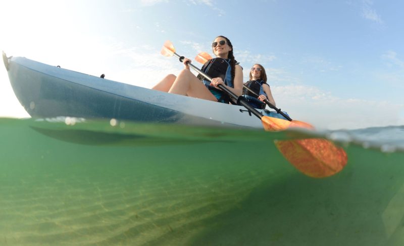 woman kayaking in the water