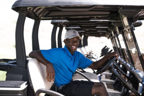 man in a golf cart