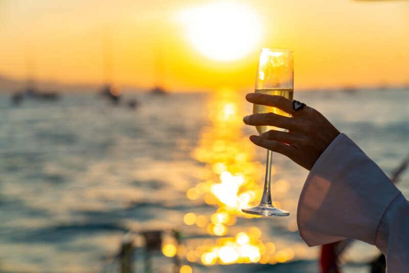 Drinking champaign on a sunset cruise.