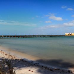 Blue sky over the Anna Maria Island City pier on Anna Maria island, Florida.